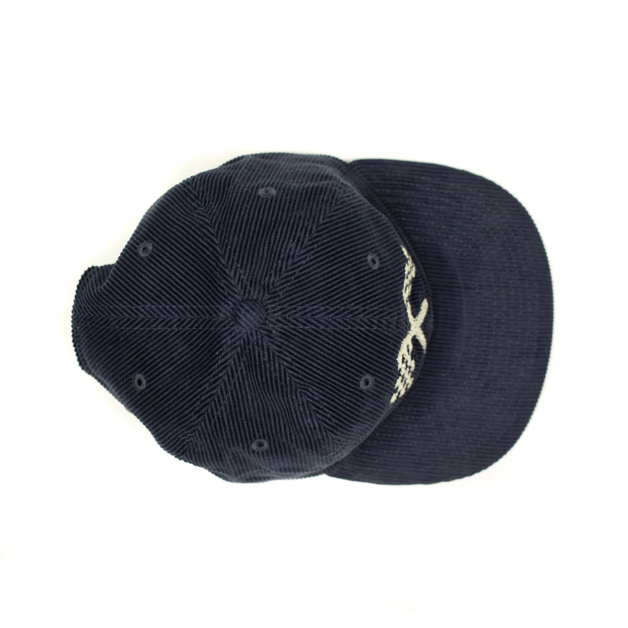 Corduroy cap in navy with racing flag chainstitched embroidery