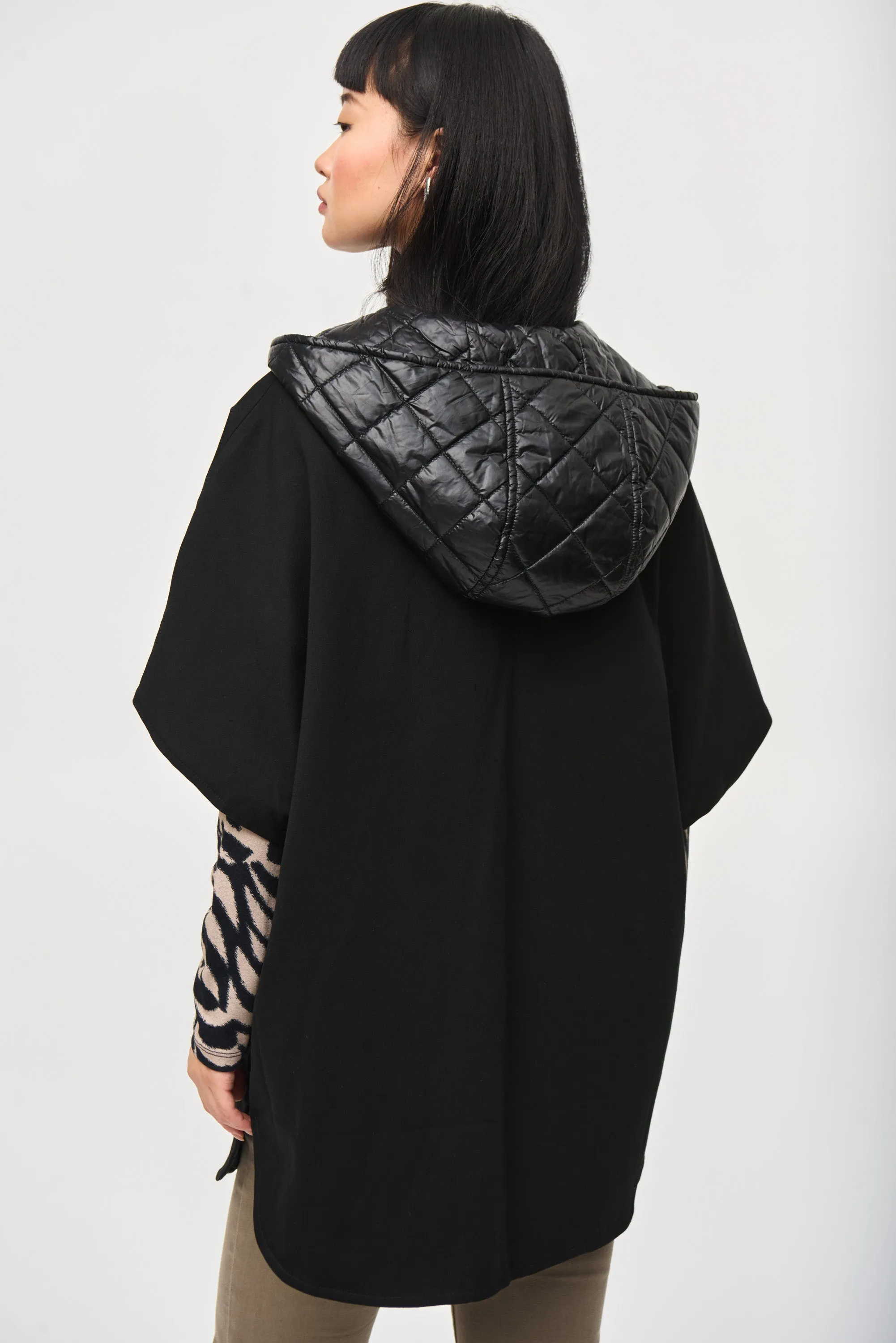 Reversible hooded cape